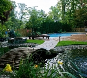 bridge-pool-fountain-landscaping-backyard-fox-hollow-fence-luxury-calm